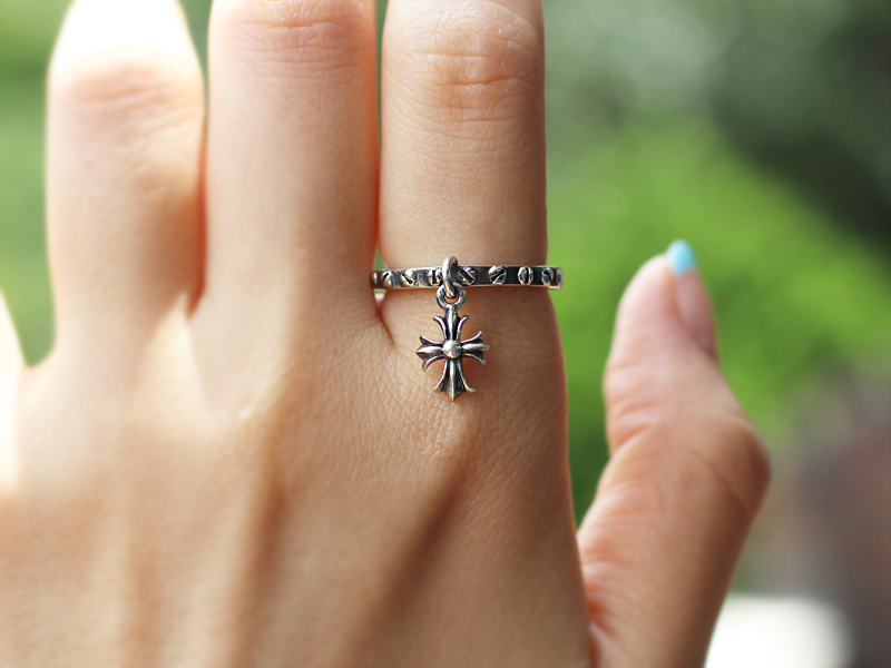 Ring with clearance cross charm